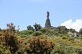 Statua San Michele on top of sardinian mountain landscape near Biddamanna IstrisÃ ili Villagrande Strisaili Arzana, Italy